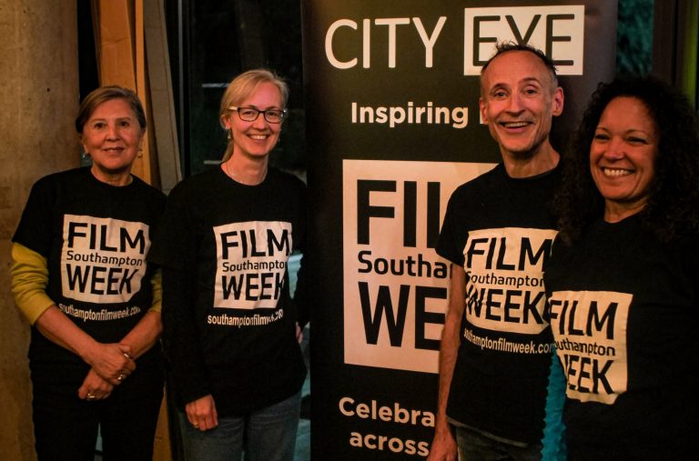 The winning team of the Film Week Quiz posing
