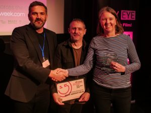City Eye Chair Darren Kerr presents Vickey Isley and Paul Smith the award for Best Artist Film